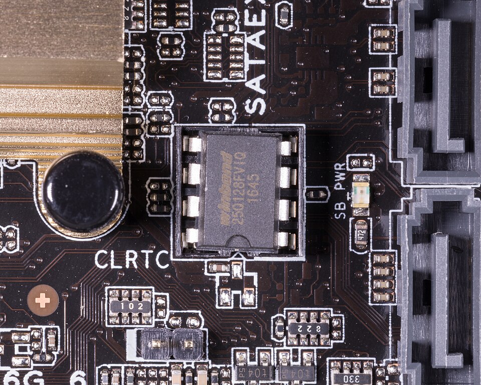 A small eight-pin BIOS chip soldered into a socket on a motherboard