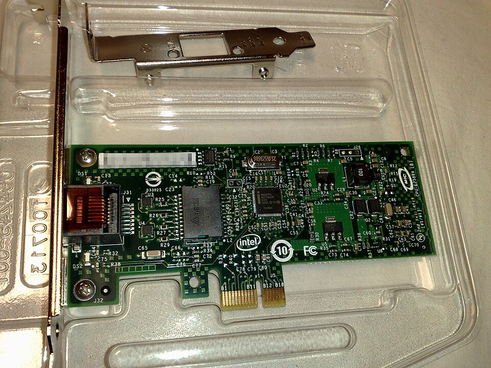 A green network interface expansion card with an Ethernet socket