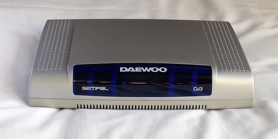 A silver digital TV set-top box