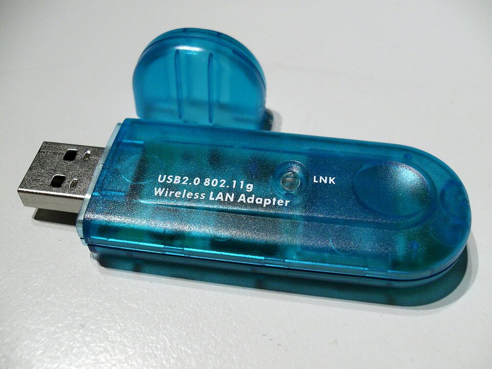 A blue USB wireless LAN adapter stick