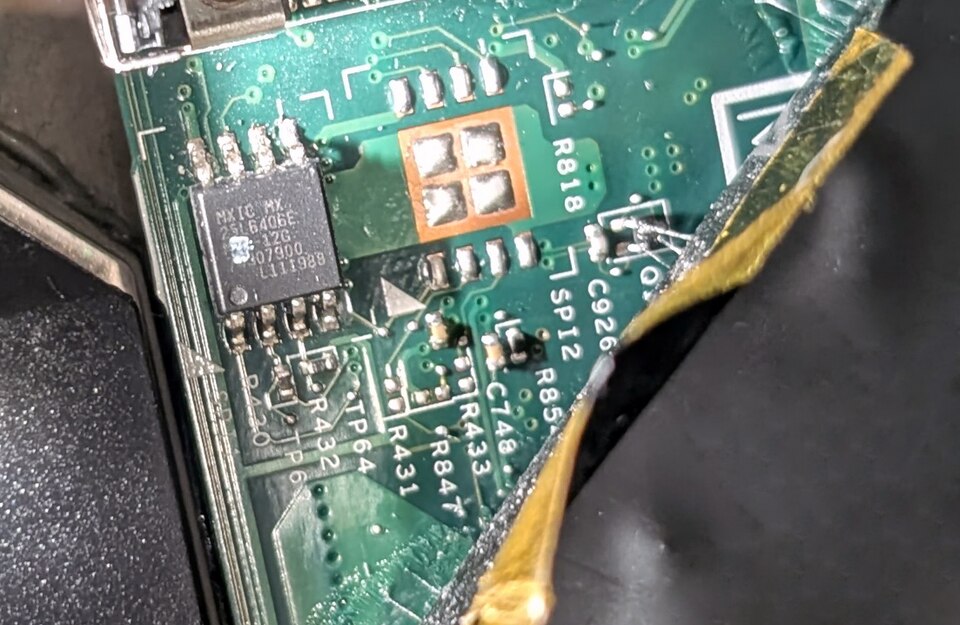 A small eight-pin flash memory chip on a laptop motherboard that stores the BIOS