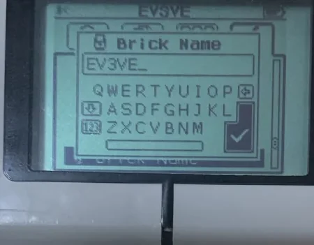 The EV3 Brick Name screen showing an on-screen keyboard and the name EV3VE being typed.
