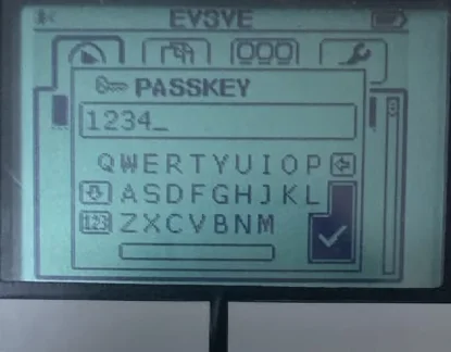 The EV3 Brick PASSKEY screen with 1234 entered and an on-screen keyboard below.