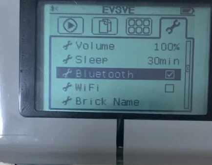 The EV3 Brick settings screen: Volume 100 percent, Sleep 30 minutes, Bluetooth with a ticked checkbox, WiFi unticked, and Brick Name.