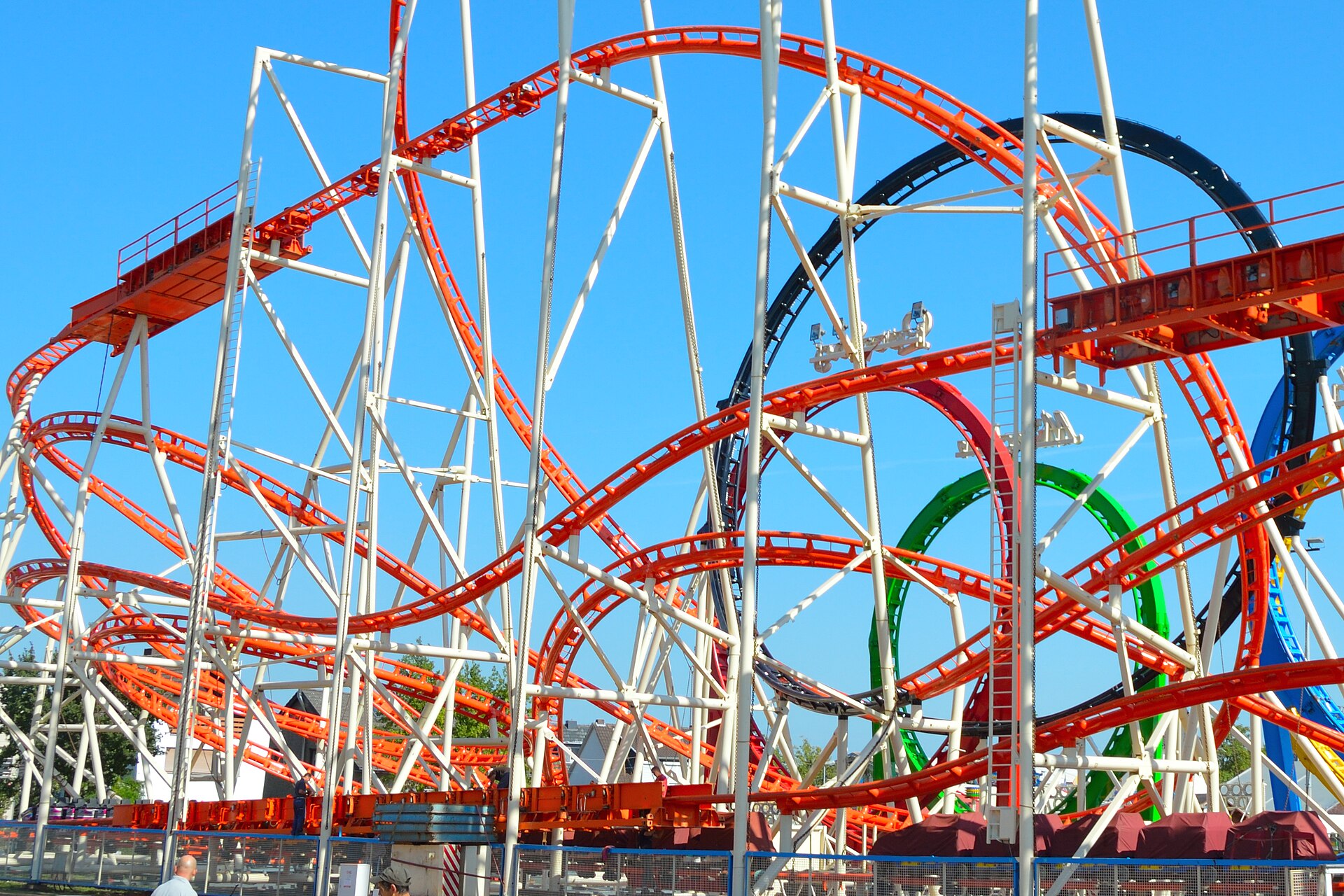 A steel roller coaster with a series of vertical loops.