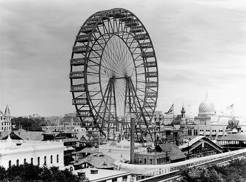 The original 1893 Ferris wheel: a huge spoked wheel with rows of passenger cars around its rim.